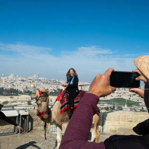 Camel ride at the top of Mount of Olives. (Photo: © Nizar Halloun/Tantur Ecumenical Institute)